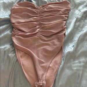Strapless pink shimmer bodysuit